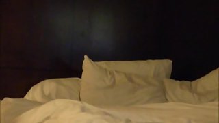 Older married mature couple making homemade porn in bedroom