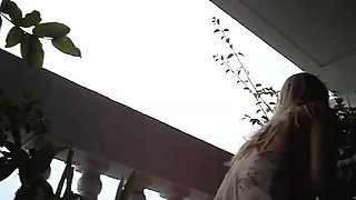 Super sexy upskirt girl gets filmed at the balcony on the hidden camera
