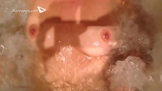 Boobs in the jacuzzi bath watching breasts bounce and massaged by water