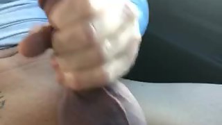 Masturbation outside in car stroking my meat