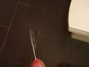 Cleaning cock in the shower in the morning