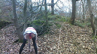 Carla poses and strips for pics in the woods