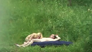 Cute blonde giving her balding lover oral and full sex outdoors
